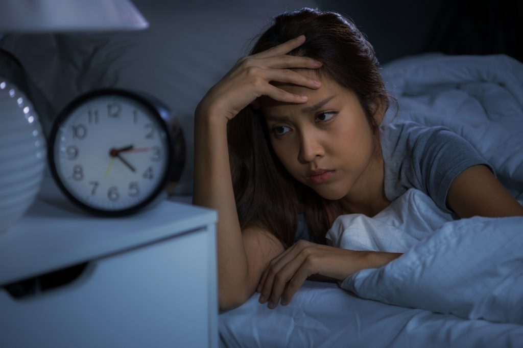stressed out woman who can't sleep
